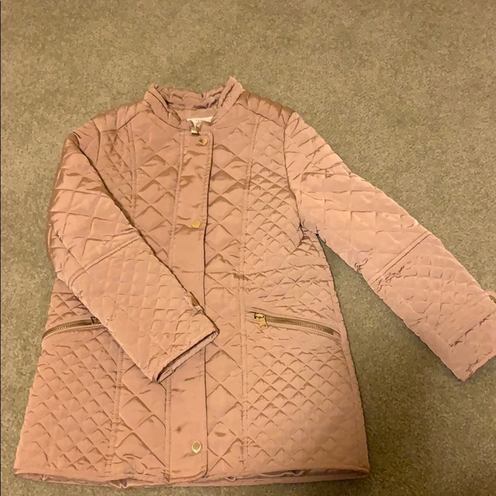 Zara girls hold quilted jacket